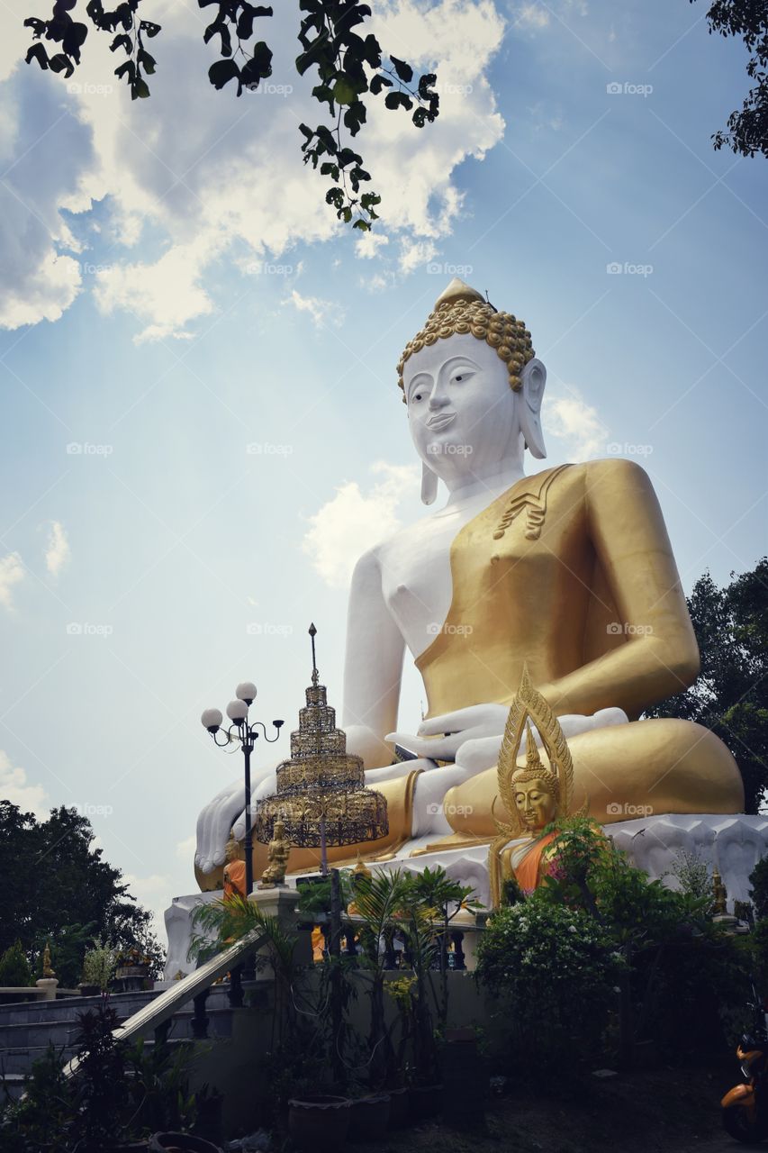 Sitting Buddha image at Wat Doi Kham.
