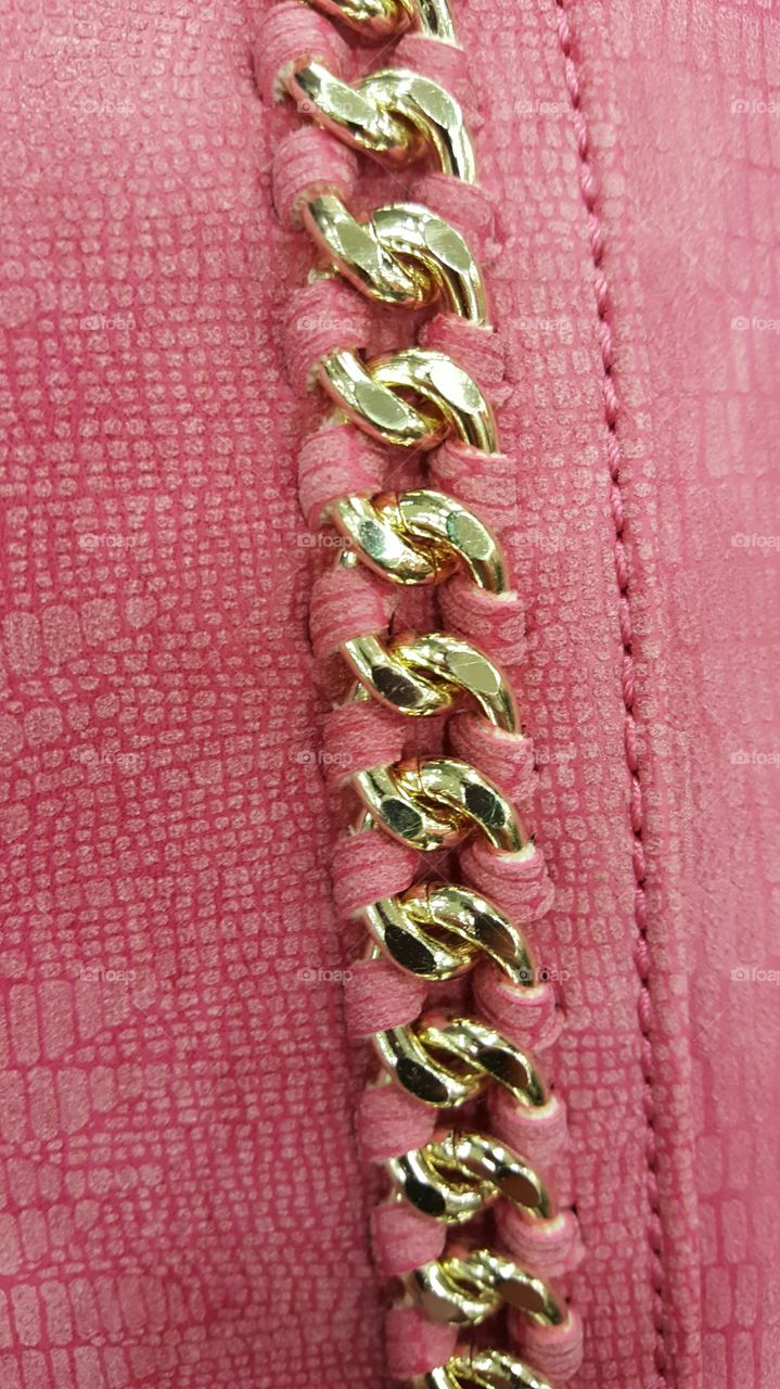 pink texture with gold loops