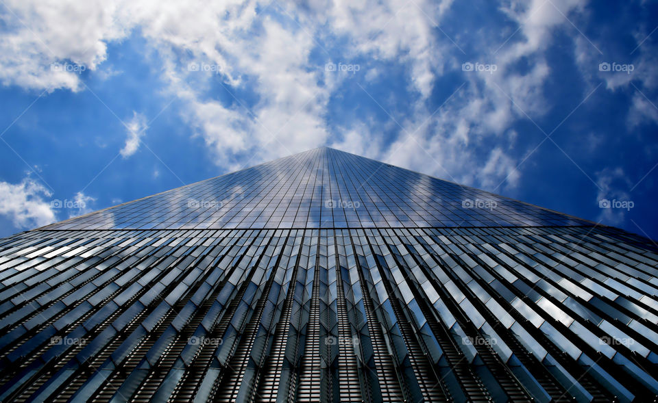 Building with cloud reflection 