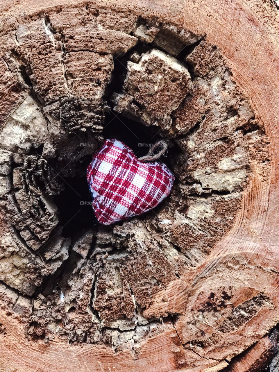 High angle view of heart shape in hole