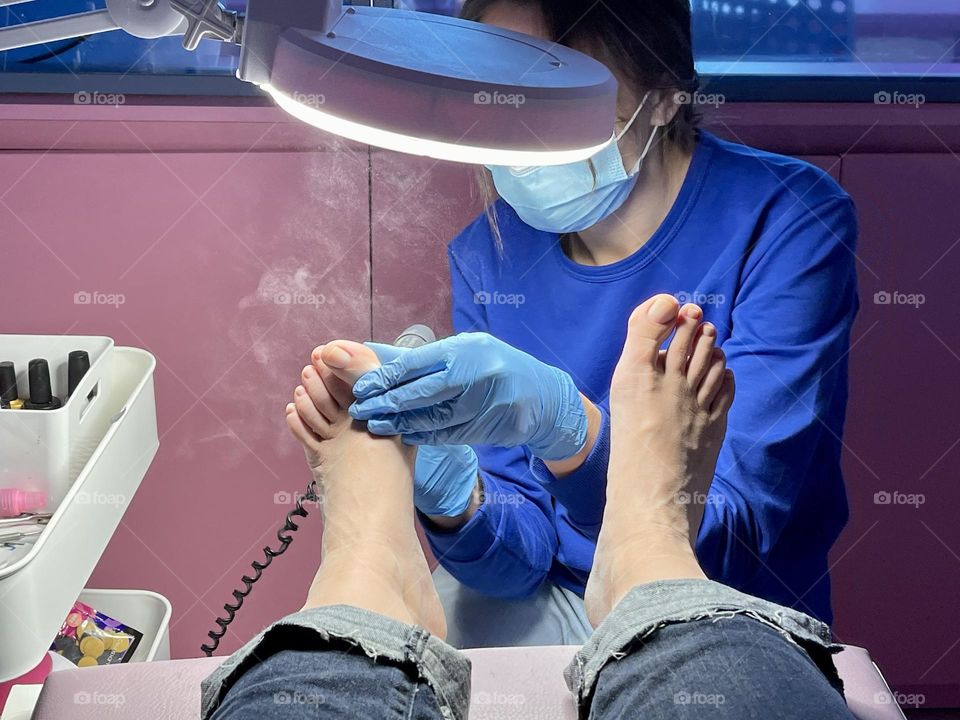 Pedicure in the beauty salon 