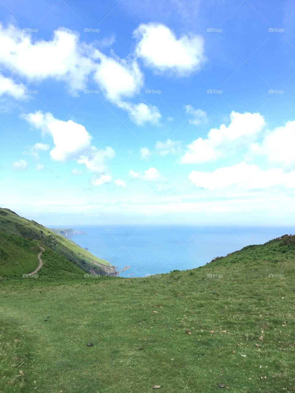 North Devon’s coastal path under a stunning sky in summer. Land, sea and sky near Ilfracombe 