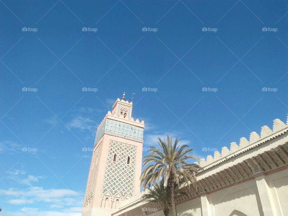 Beautiful minaret of a mosque at marrakech city in Morocco.