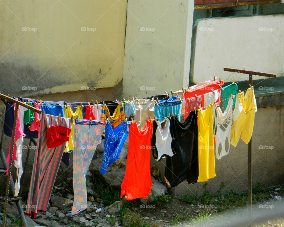 Cuba: Clothesline in a Cuban neighborhood. As I see Santiago de Cuba in black and white, and sometimes in color! Cuba is a special destination and people know how to enjoy themselves, despite obvious signs of poverty and hardships. The streets are filled with vibrant colors and rhythm and it is not uncommon to see people dancing in the streets and alleys to the sound of loud salsa music! Wish I could, but It's impossible to capture it all!