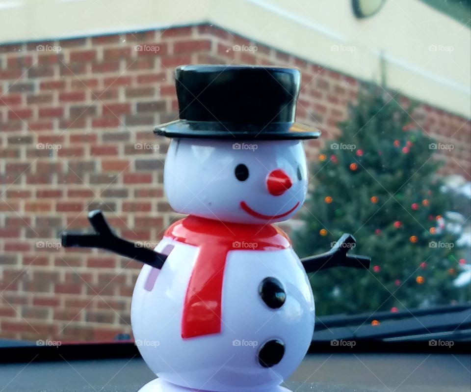 As frosty sits on our dash. We are always finding new back grounds ggie him.