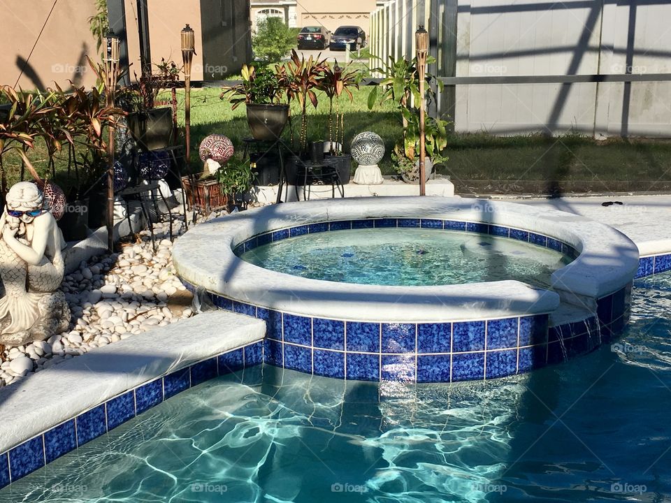 My favorite spot in my home is in the pool