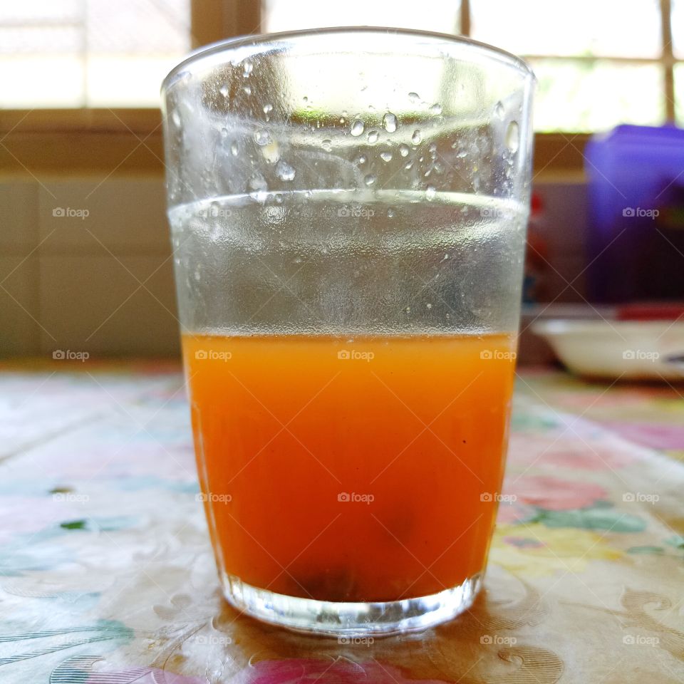 freshly squeezed orange by hand