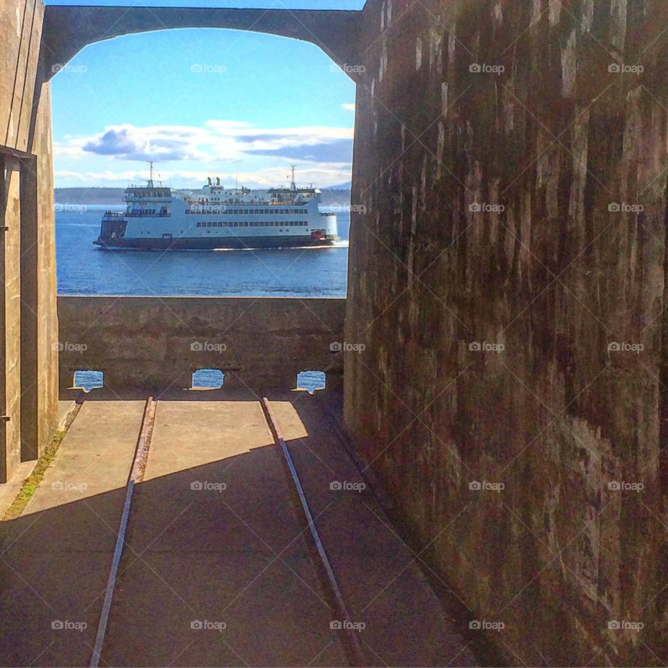 Ferry at Fort Casey. Here is the Keystone Ferry passing by Fort Casey at the waterfront lookout. Whidbey Island.