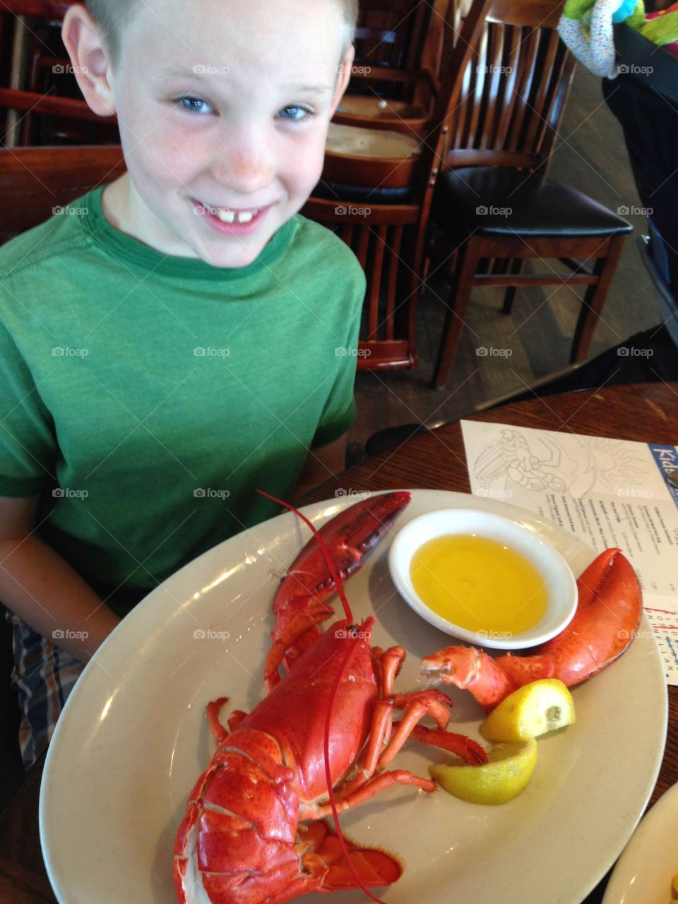 Boy Eating Lobster