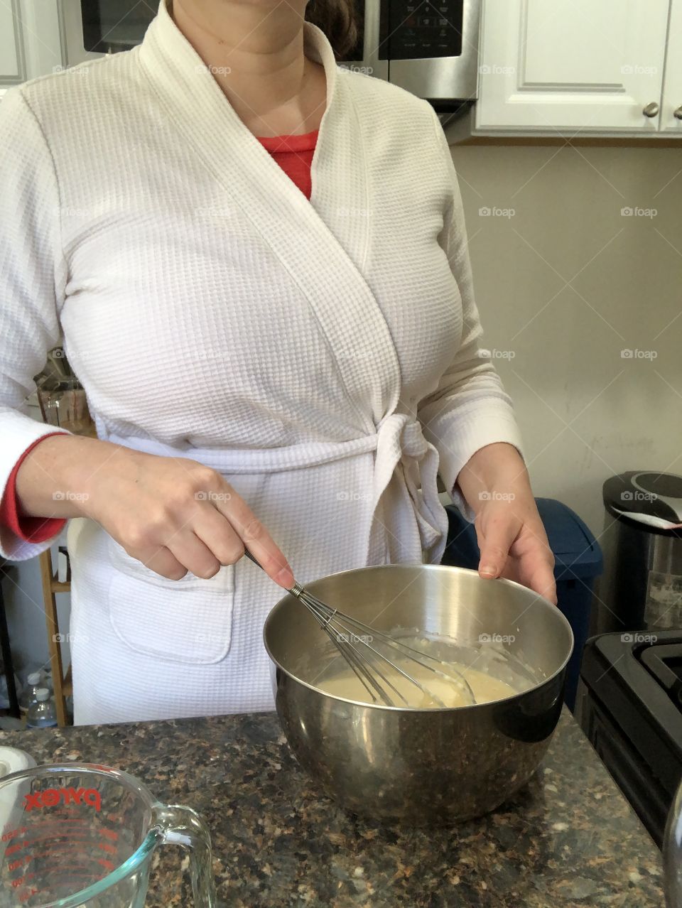 Woman making pancake batter