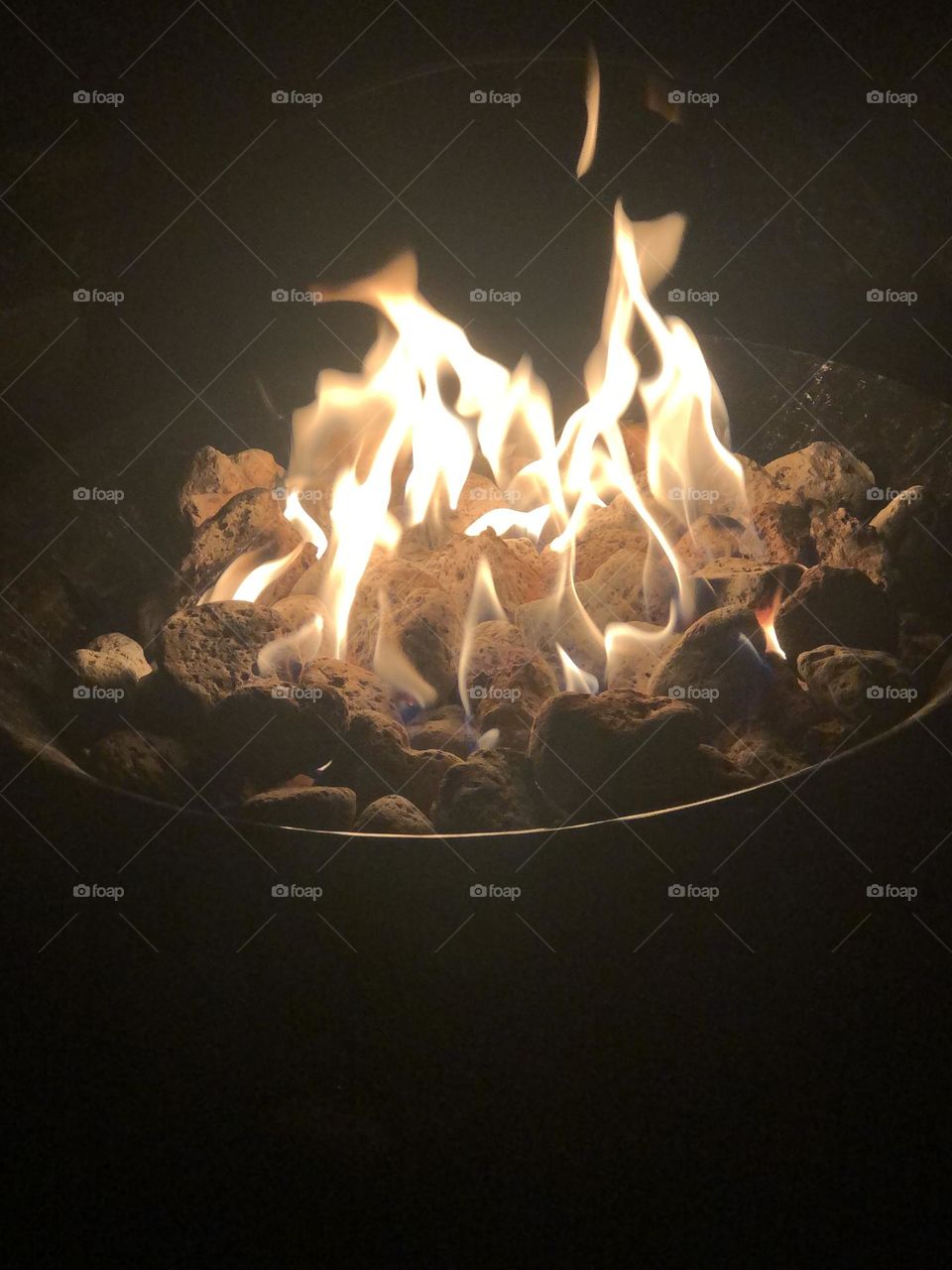 Fire pit glowing at night 