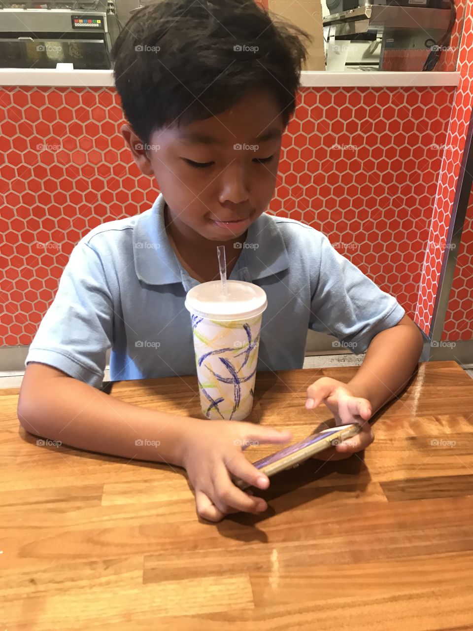 Kid and his phone