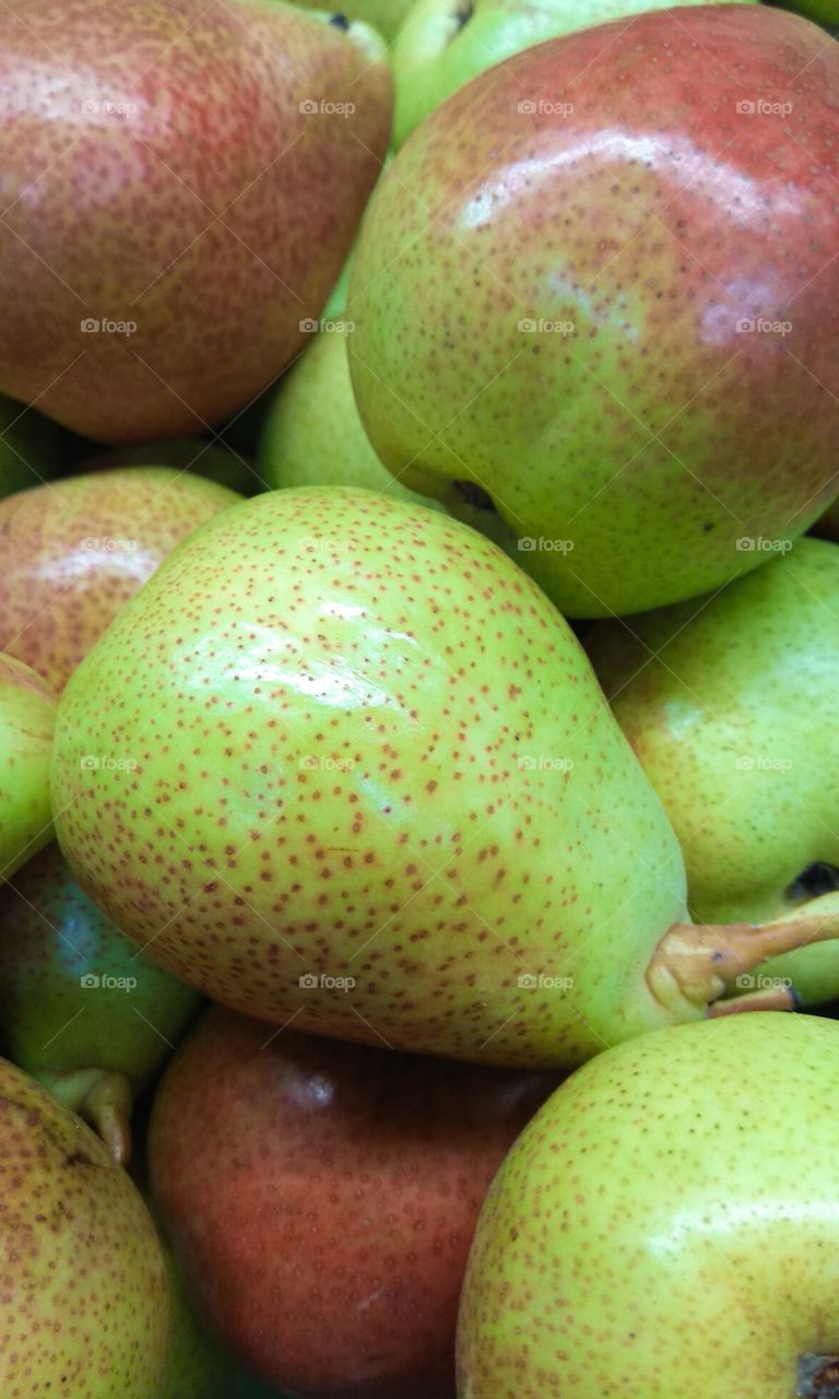 Juicy pear close-up photographed at the market