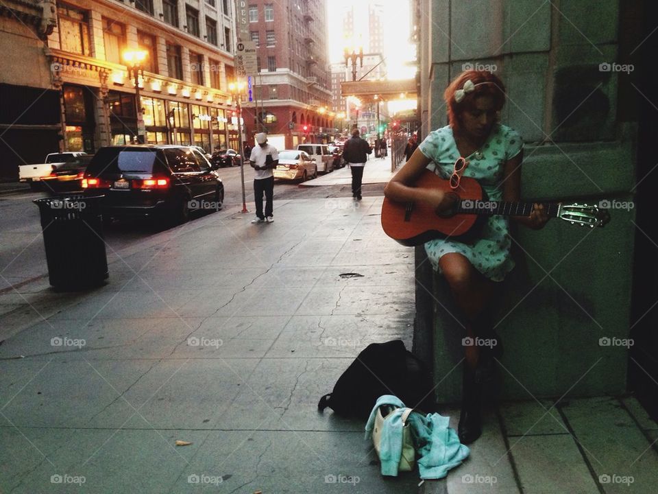 Woman Playing Guitar