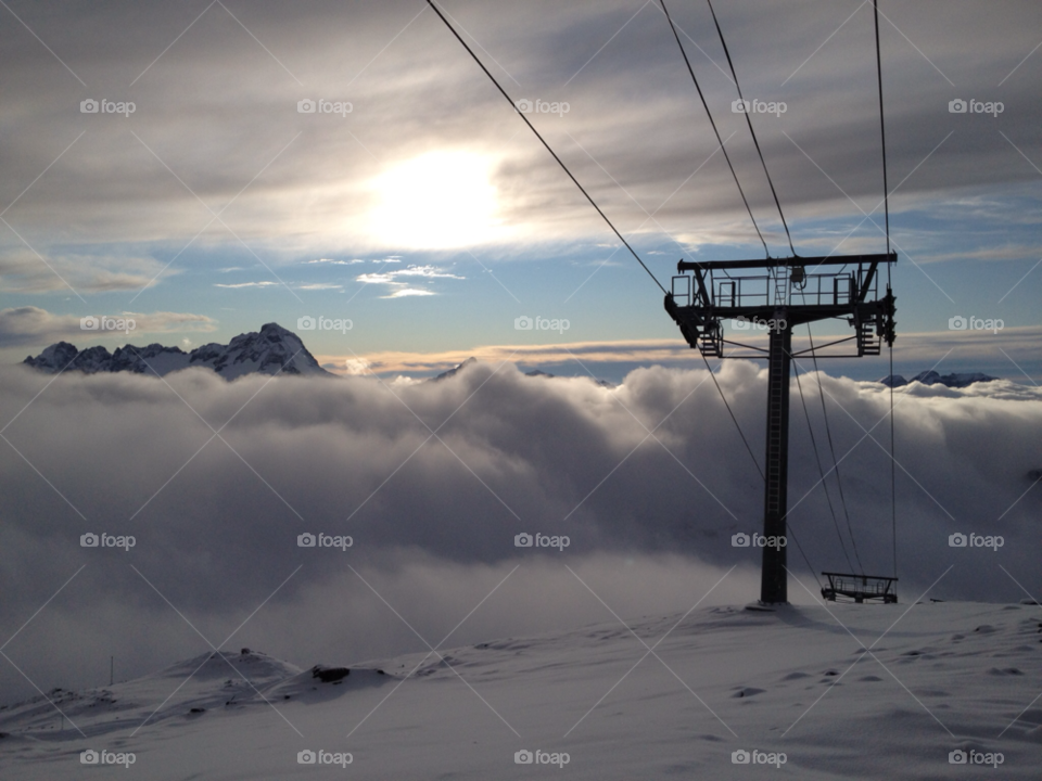 clouds mountains alps ski lift by ips