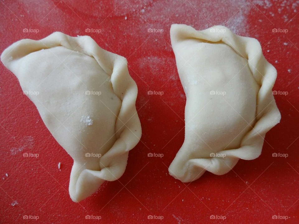 Polosh dumplings 'pierogi'  with cottage cheese and boiled potatoes very popular in Poland