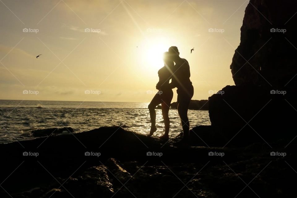 Sunrise#sea#couple#love#silhouette#rocks#sky