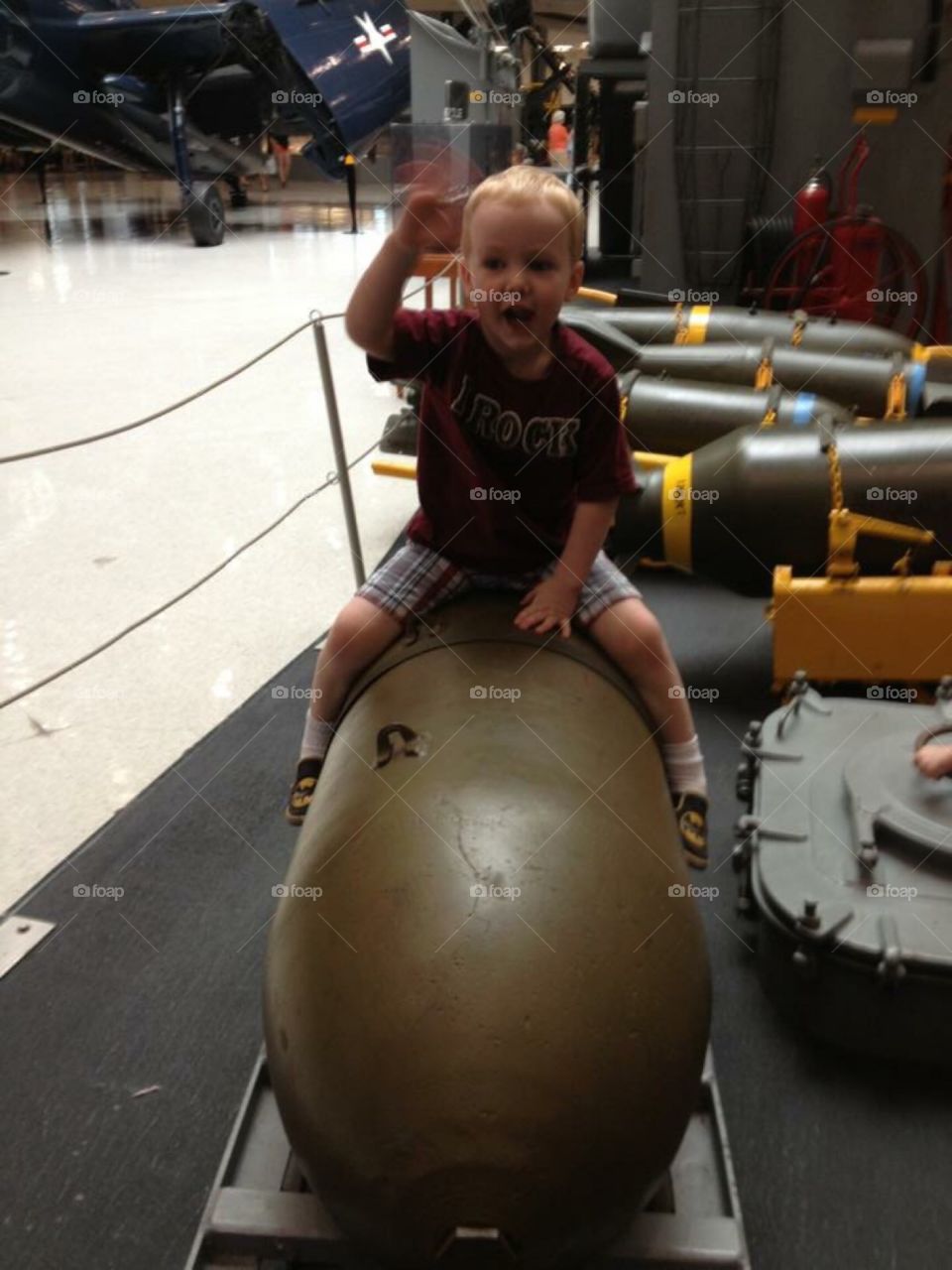 Child riding bomb