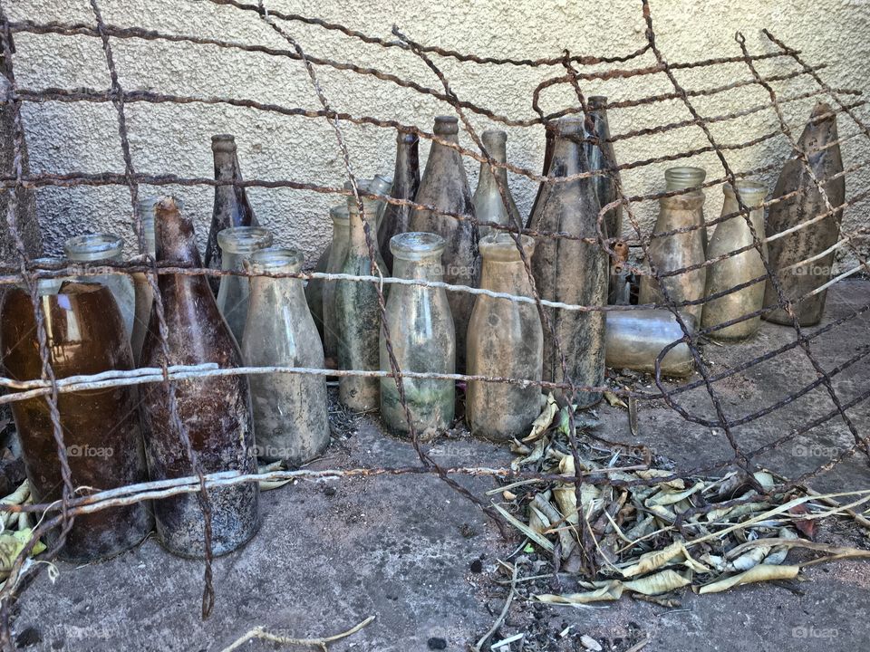 Grungy old bottles . A collection of grungy old antique bottles dug up in back yard in south Australia 