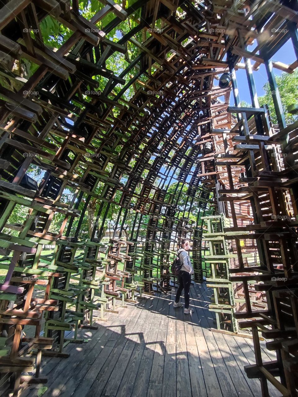 Dome built with  school used wooden chairs, installation decoration