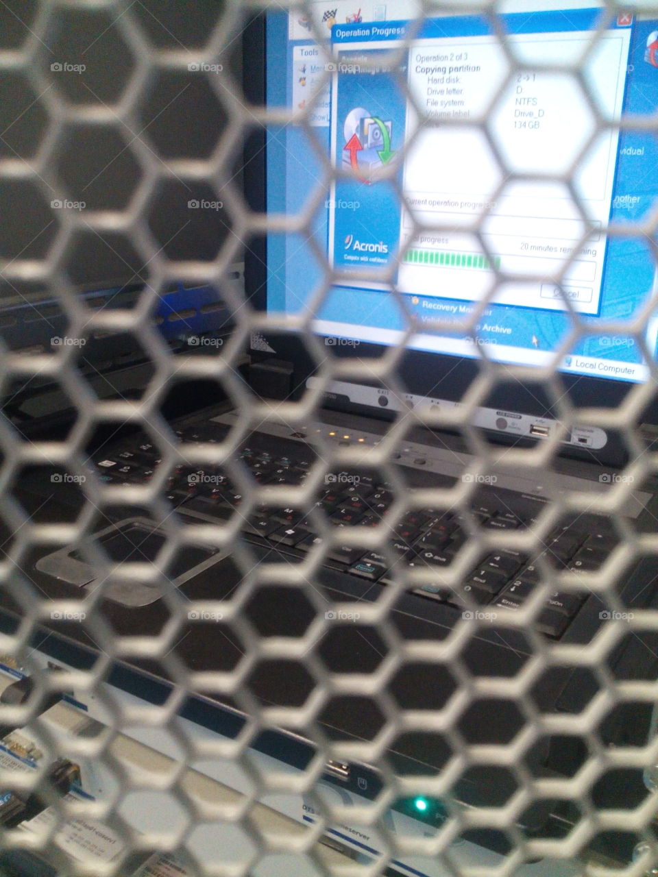 Look through the metal grille in the form of a honeycomb