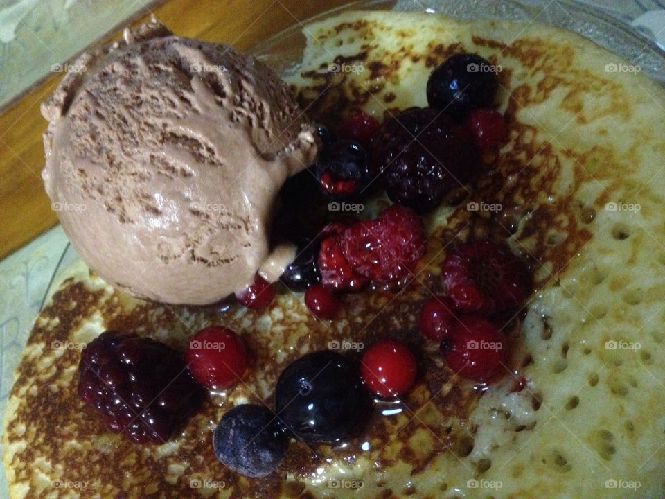 Pancakes with berries, mayple syrup