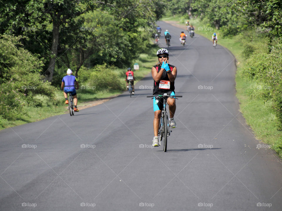 Man posing in Cyclotron race, cycling