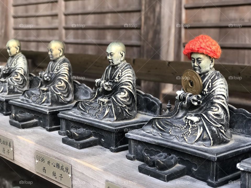 An offering - Buddhist statues