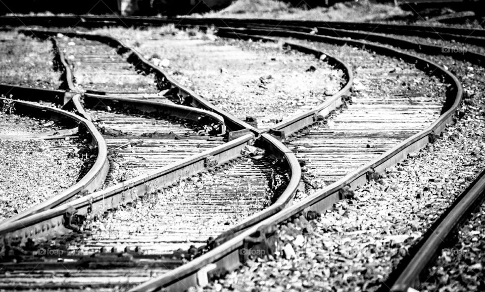 Railroad track switches in black and white. San Diego, California, USA.  