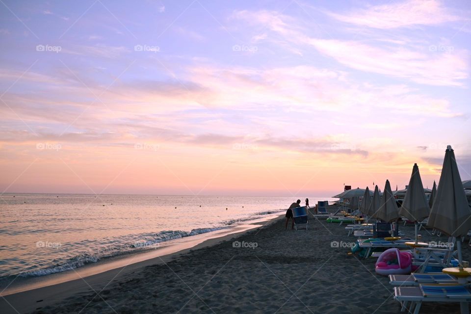 clear and colorful sunset on the beach