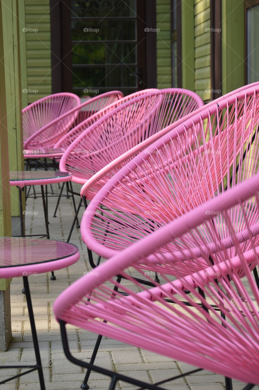 Empty chairs near wall