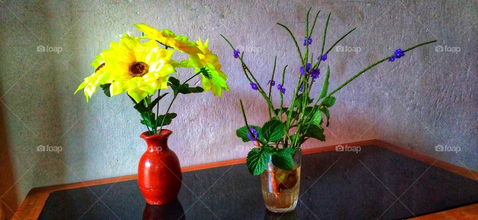 Real flower decoration and fake flowers.