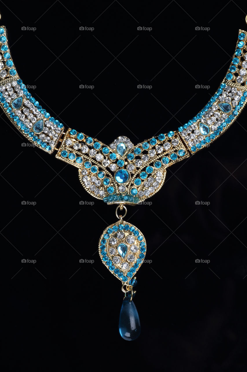 Blue Diamond jewelry on black background