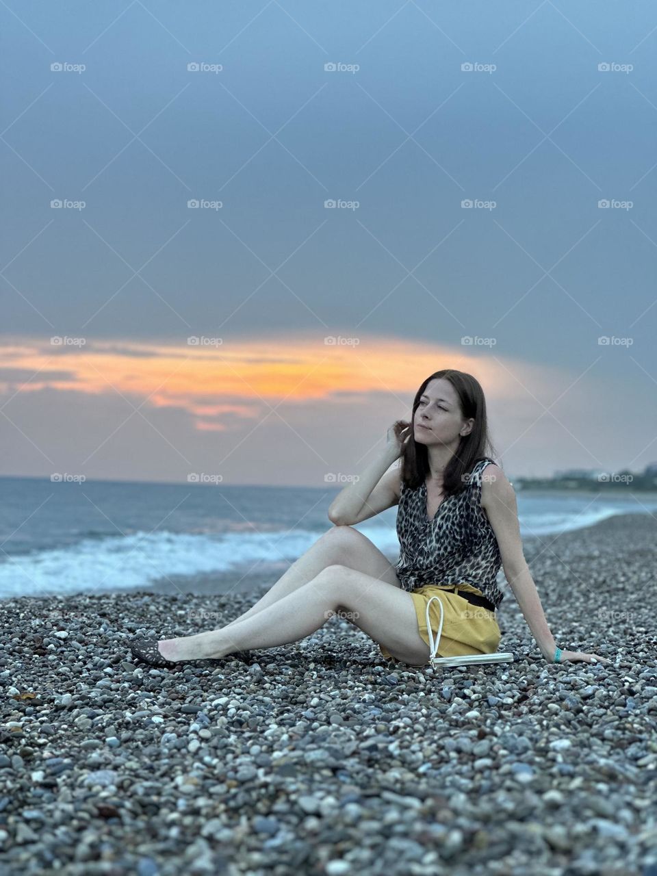 girl resting meditation on the sea