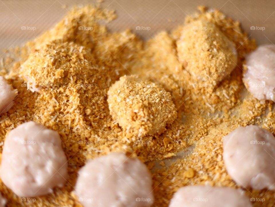 Chicken nuggets in the process 