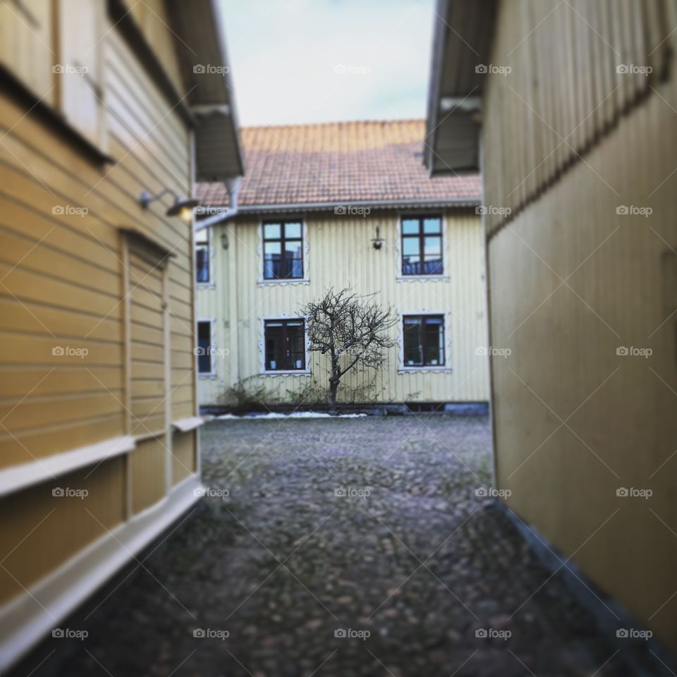 View of houses in narrow alley