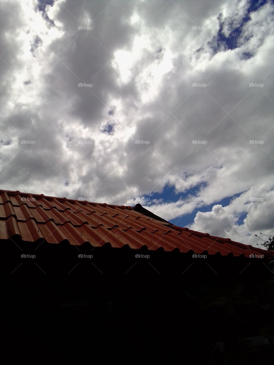 clouds & roof , raining