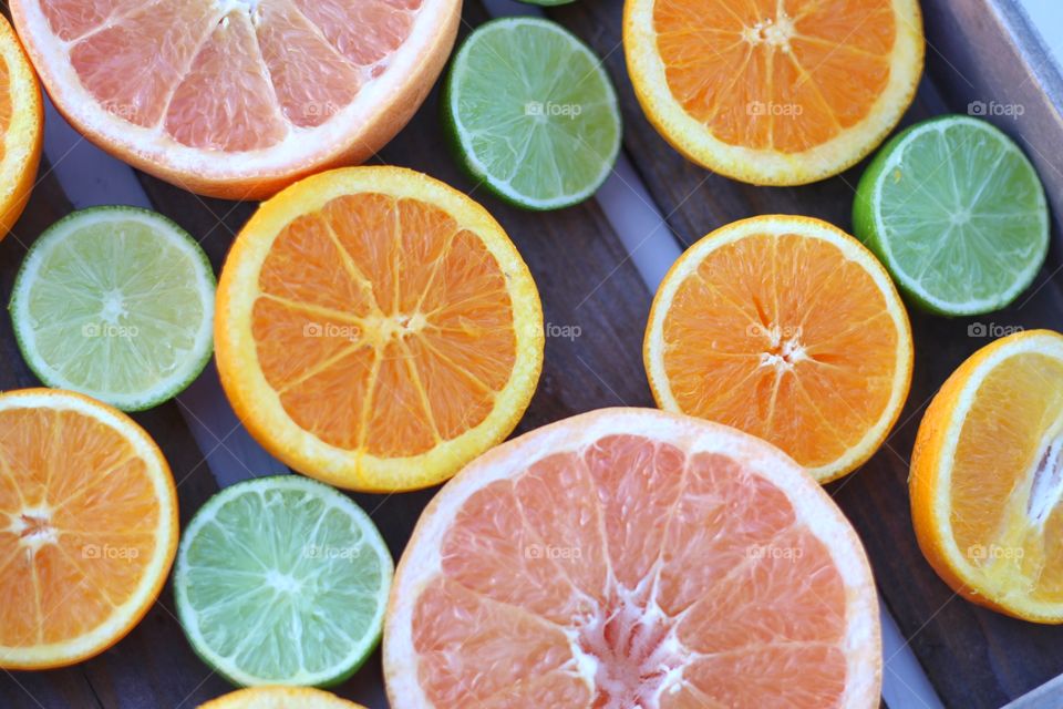 Slices of different citrus fruits