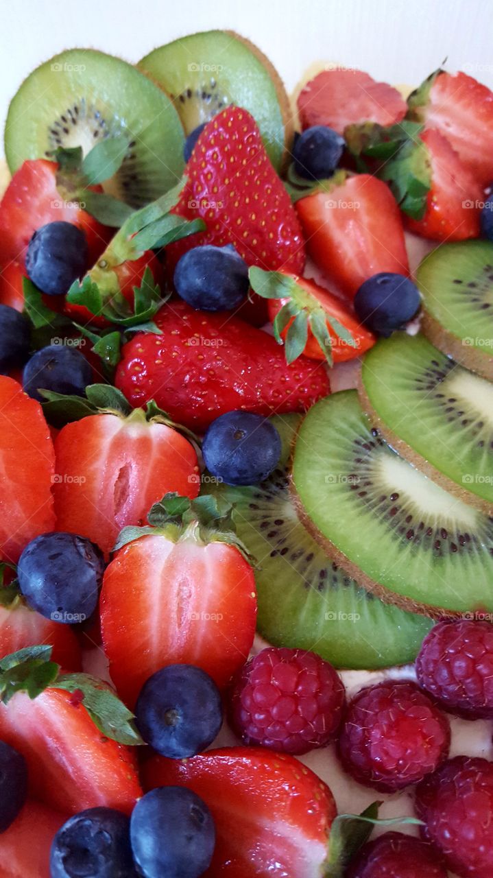 Fresh fruit with kiwi, raspberry, strawberry and blueberry