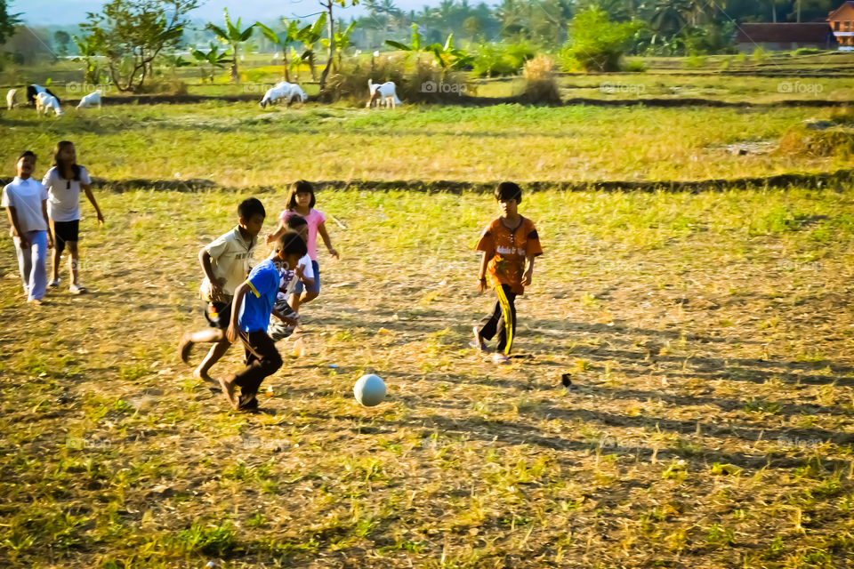 Child Playing Football...
