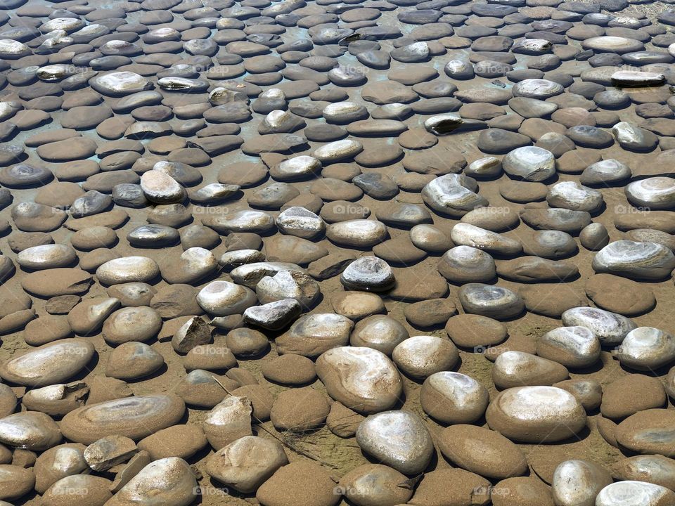 Rocks under the shallow water 