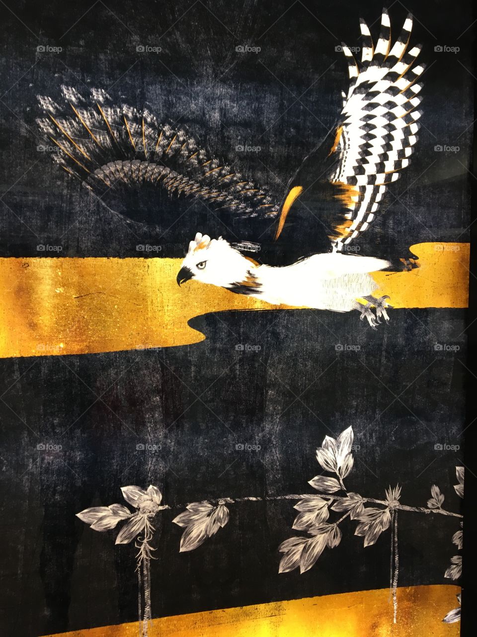 Painting of bird of prey, yellow and black