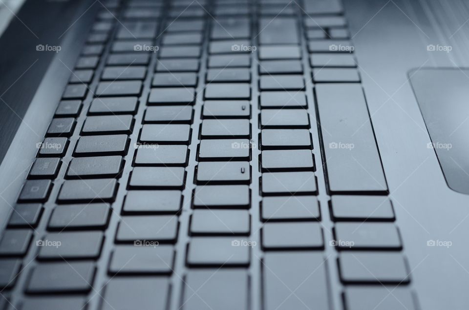 Keys on this laptop computer line up in lanes like a highway.