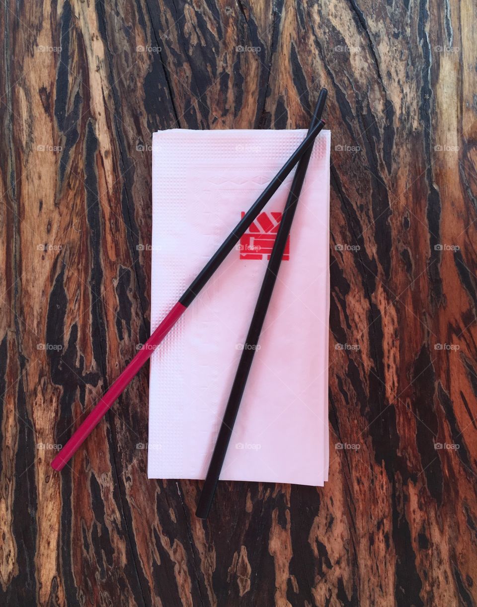 Chopsticks and Napkin on Wooden Table - Chinese Noodle Restaurant in Shenzhen, China