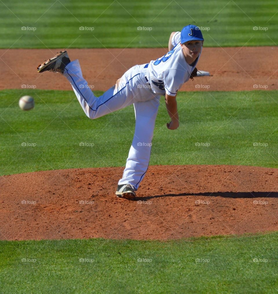 High school baseball pitcher.  