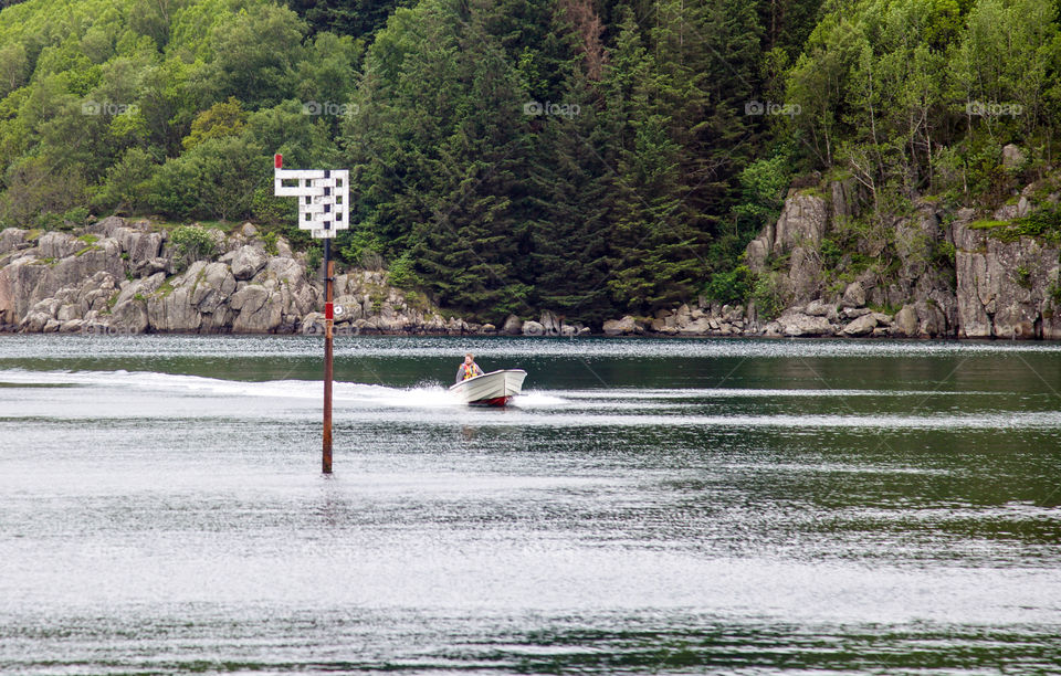 Speed boat in the fjords. 