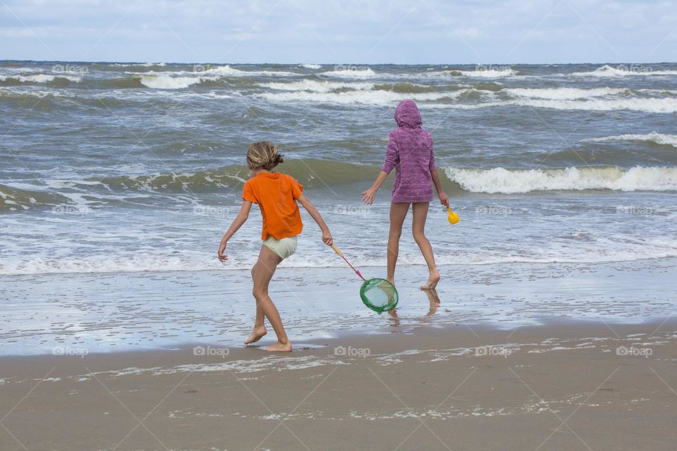 Children playing at the Dutch North Sea beach. Summer in the Netherlands. Zandvoort 