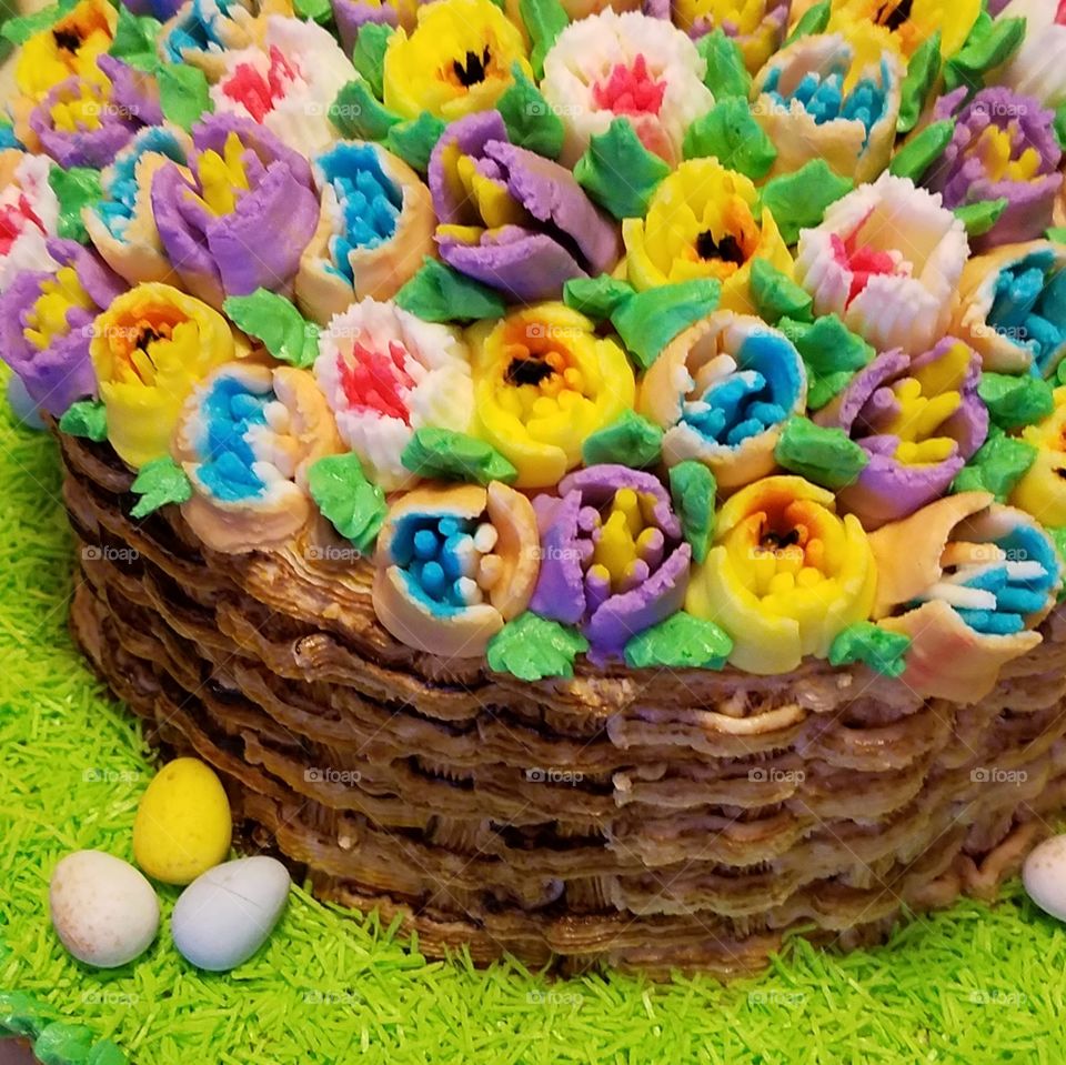 colorful buttercream flowers on cake