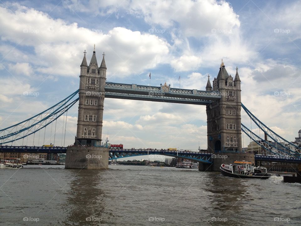 Tower Bridge. This photo was taken in my second trip to London, on August, 2013. It was a sunny day! Boat view.