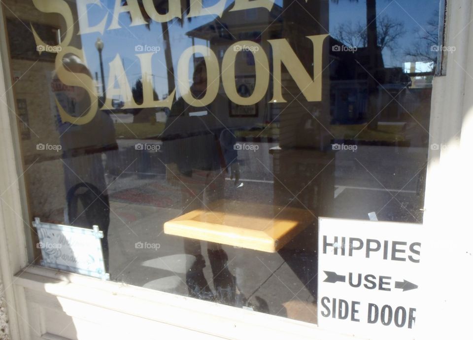 Saloon with hippie sign